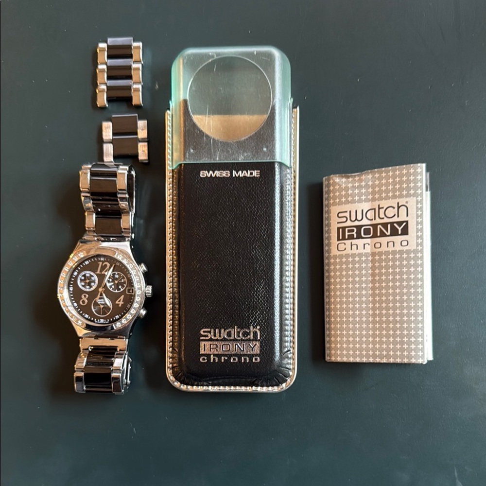 Swatch Watch women’s Irony Chrono Black and silver Watch. Needs new battery.